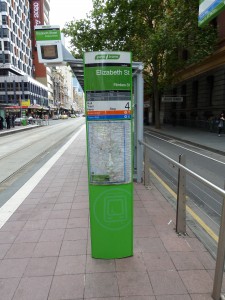 Flinders Street & Elizabeth Street Tram Stop Signage With Next Time Running